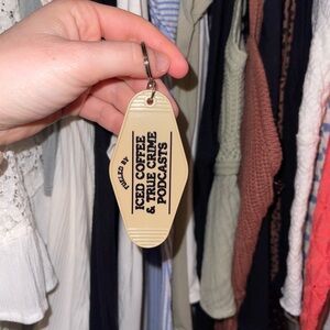 Cream Keychain with Fueled By Iced Coffee & True Crime PodcastsText